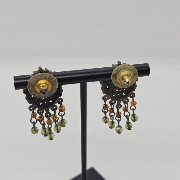 bronze colored earrings with green and orange beading - Picture 2 of 3